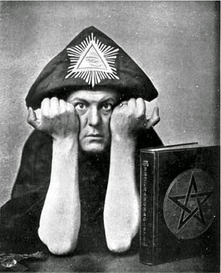 Aleister Crowley wearing the head-dress of Horus